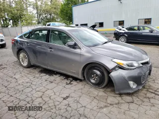 2014 Toyota Avalon Limited z VIN 4T1BD1EB4EU030790, wystawiony jako Copart lot #55202195 z przebiegiem 143 222 mil mil oraz Czysty tytuł • Clean title. Historia ofert i sprzedaży dostępna na DreamBid. Obrazek 4.
