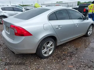 2014 Volvo S60 T5 with VIN YV1612FS0E1291364, listed as a IAAI auction lot 42130425 with 140,497 mi miles. Bid and sale history available at carsss.com. Image 4.