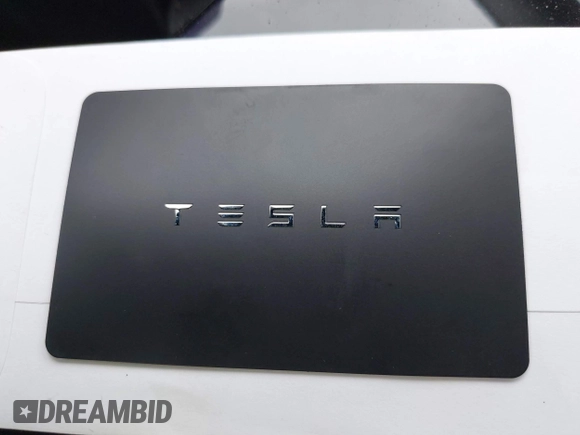 2020 Tesla Model 3 Long Range with VIN 5YJ3E1EB6LF666624, listed as a IAAI auction lot 41720664 with 65,973 mi miles. Bid and sale history available at carsss.com. Image 11.