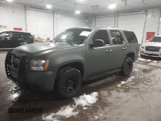 2014 Chevrolet Tahoe Commercial with VIN 1GNSK2E05ER196941, listed as a IAAI auction lot 41938892 with 176,170 mi miles and . Bid and sale history available at DreamBid. Image 18.