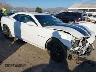2014 Chevrolet Camaro LT z VIN 2G1FC1E39E9321549, wystawiony jako IAAI lot #41582840 z przebiegiem 129 495 mil mil oraz . Historia ofert i sprzedaży dostępna na DreamBid. Obrazek 1.