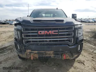 2021 GMC Sierra 2500HD AT4 with VIN 1GT49PEY0MF193638, listed as a Copart auction lot 48352925 with 140,995 mi miles and Salvage Title. Bid and sale history available at carsss.com. Image 5.