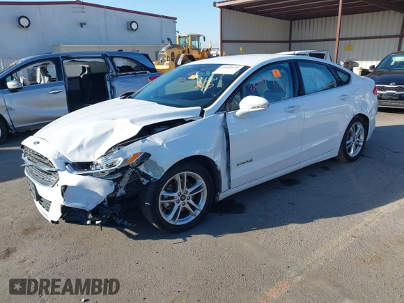 2015 Ford Fusion SE Hybrid with VIN 3FA6P0LU3FR249444, listed as a IAAI auction lot 41602659 with 145,024 mi miles. Bid and sale history available at carsss.com. Image 17.