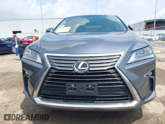 2016 Lexus RX 350 z VIN 2T2ZZMCAXGC031079, wystawiony jako IAAI lot #42120190 z przebiegiem 142 407 mil mil oraz . Historia ofert i sprzedaży dostępna na DreamBid. Obrazek 12.