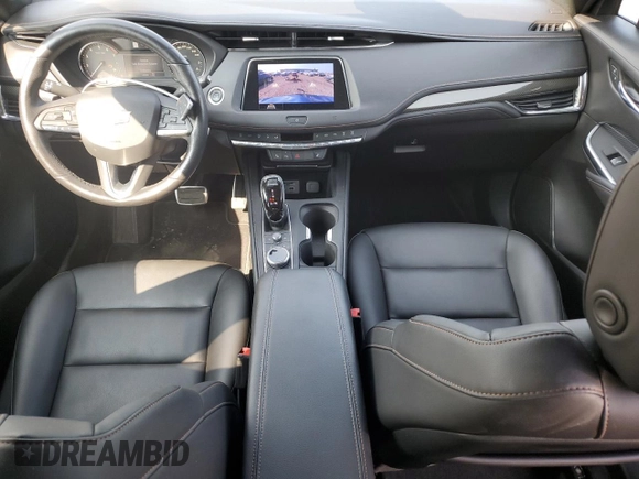 2020 Cadillac XT4 AWD Sport z VIN 1GYFZFR47LF140227, wystawiony jako Copart lot #63984125 z przebiegiem 36 080 mil mil oraz Czysty tytuł • Clean title. Historia ofert i sprzedaży dostępna na DreamBid. Obrazek 8.