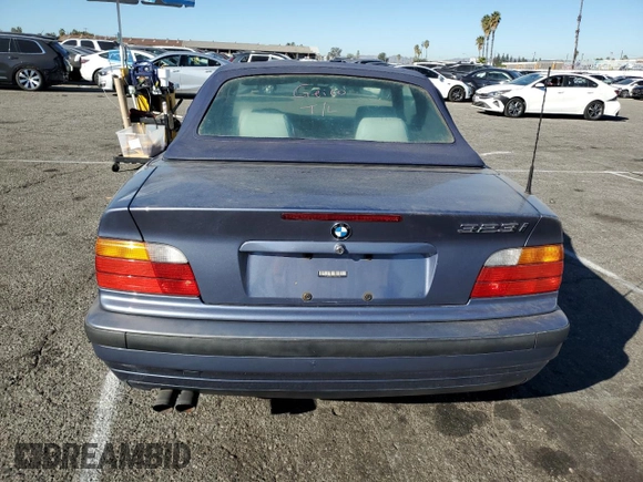 1999 BMW 3 Series 323icA with VIN WBABJ8332XEM24560, listed as a Copart auction lot 80756544 with 63,056 mi miles and Salvage Title. Bid and sale history available at carsss.com. Image 6.