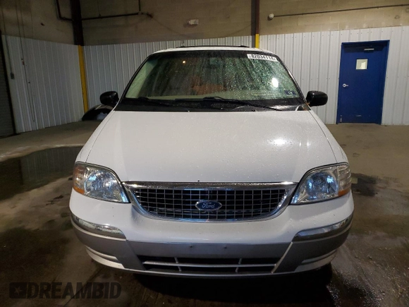 2003 Ford Windstar SEL z VIN 2FMZA53423BA17185, wystawiony jako Copart lot #82034114 z przebiegiem 64 807 mil mil oraz Szkoda całkowita • Salvage title. Historia ofert i sprzedaży dostępna na DreamBid. Obrazek 5.