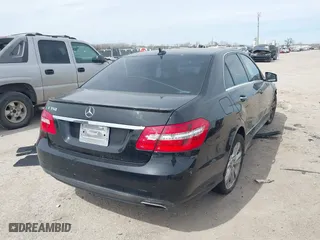 2013 Mercedes-Benz E-Class E 350 Luxury with VIN WDDHF5KBXDA662302, listed as a IAAI auction lot 41797633 with 153,644 mi miles. Bid and sale history available at carsss.com. Image 4.