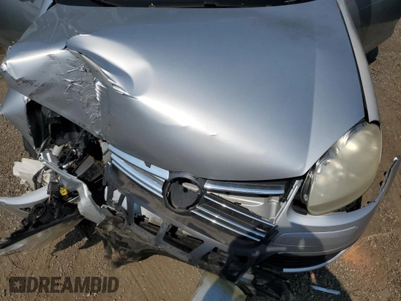 2007 Volkswagen Jetta Wolfsburg Edition z VIN 3VWEF71K07M168433, wystawiony jako Copart lot #60796705 z przebiegiem Nie podano mil oraz Szkoda całkowita • Salvage title. Historia ofert i sprzedaży dostępna na DreamBid. Obrazek 11.