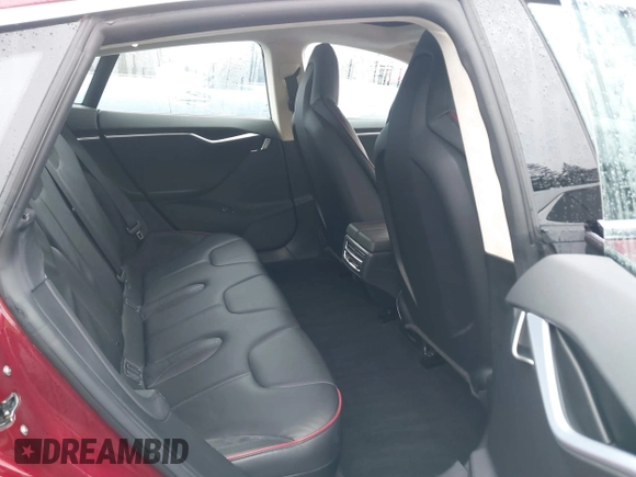 2012 Tesla Model S Performance with VIN 5YJSA1DP3CFS00394, listed as a IAAI auction lot 41309464 with 91,561 mi miles and . Bid and sale history available at DreamBid. Image 8.
