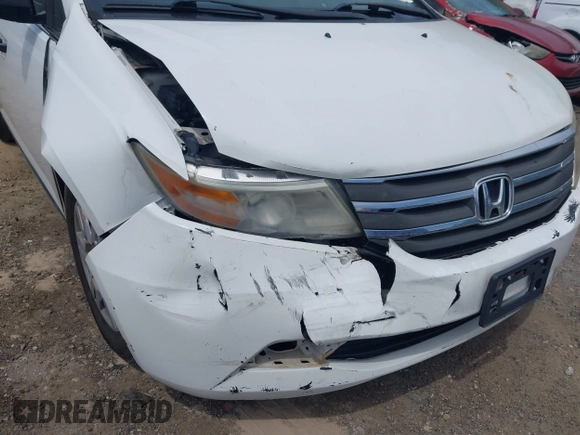 2012 Honda Odyssey LX z VIN 5FNRL5H28CB096385, wystawiony jako IAAI lot #42304664 z przebiegiem 105 010 mil mil oraz . Historia ofert i sprzedaży dostępna na DreamBid. Obrazek 6.