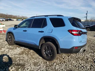 2024 Honda Pilot TrailSport with VIN 5FNYG1H6XRB023507, listed as a Copart auction lot 81461214 with 12,036 mi miles and Salvage Title. Bid and sale history available at carsss.com. Image 2.