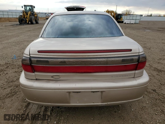 1998 Cadillac Catera z VIN W06VR52R5WR028774, wystawiony jako Copart lot #78085484 z przebiegiem 104 609 mil mil oraz Szkoda całkowita • Salvage title. Historia ofert i sprzedaży dostępna na DreamBid. Obrazek 6.