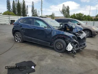 2024 Mazda CX-30 S Preferred with VIN 3MVDMBCM5RM635014, listed as a Copart auction lot 54267705 with 22,075 mi miles and Non Repairable. Bid and sale history available at DreamBid. Image 4.