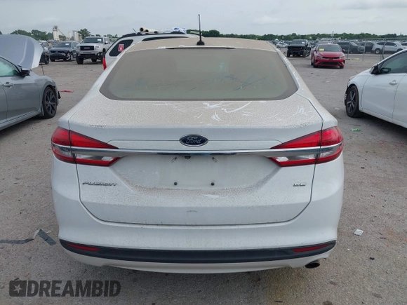 2018 Ford Fusion SE with VIN 3FA6P0H79JR198057, listed as a IAAI auction lot 41815410 with 174,746 mi miles and . Bid and sale history available at DreamBid. Image 16.