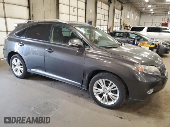2010 Lexus RX 450h with VIN JTJBC1BA6A2412549, listed as a Copart auction lot 53206825 with 242,407 mi miles and Clean title. Bid and sale history available at DreamBid. Image 4.