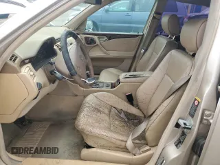 2001 Mercedes-Benz E-Class with VIN WDBJF70J31B293515, listed as a Copart auction lot 53100915 with 0 mi miles and Salvage Title. Bid and sale history available at carsss.com. Image 7.
