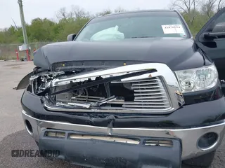 2011 Toyota Tundra 4WD Truck with VIN 5TFDW5F10BX166901, listed as a IAAI auction lot 41876554 with 207,187 mi miles. Bid and sale history available at carsss.com. Image 10.