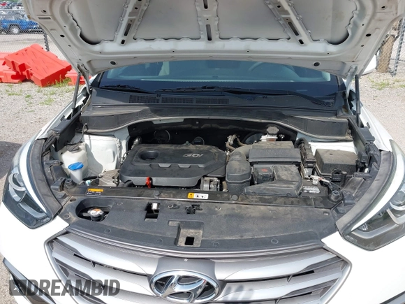 2017 Hyundai Santa Fe 2.4L with VIN 5NMZTDLB5HH018198, listed as a IAAI auction lot 42523632 with 144,883 mi miles and . Bid and sale history available at DreamBid. Image 10.