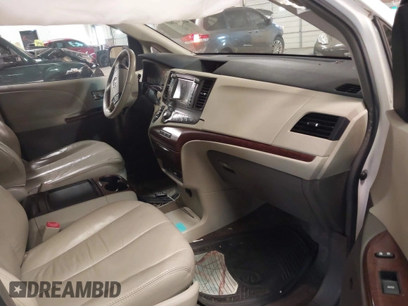2011 Toyota Sienna XLE AAS with VIN 5TDYK3DC5BS130066, listed as a IAAI auction lot 41294340 with 156,591 mi miles and . Bid and sale history available at DreamBid. Image 5.