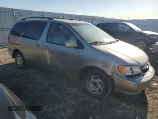 2001 Toyota Sienna LE with VIN 4T3ZF13C91U325132, listed as a Copart auction lot 52821605 with 382,472 mi miles and Salvage Title. Bid and sale history available at carsss.com. Image 4.