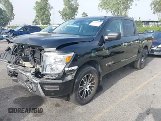 2021 Nissan Titan Pro-4X with VIN 1N6AA1ED8MN502425, listed as a IAAI auction lot 42464389 with 38,957 mi miles and . Bid and sale history available at DreamBid. Image 2.