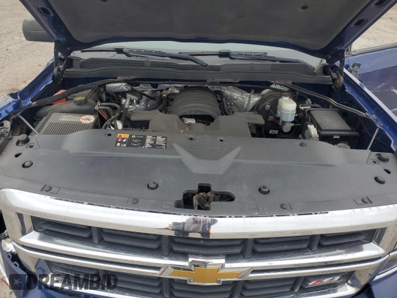 2014 Chevrolet Silverado 1500 LT with VIN 1GCUKREC3EF195504, listed as a Copart auction lot 49352085 with 128,235 mi miles and Salvage Title. Bid and sale history available at DreamBid. Image 12.