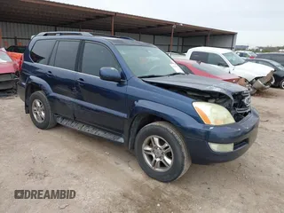 2004 Lexus GX 470 with VIN JTJBT20X340064559, listed as a IAAI auction lot 41240821 with 394,295 mi miles. Bid and sale history available at carsss.com. Image 1.