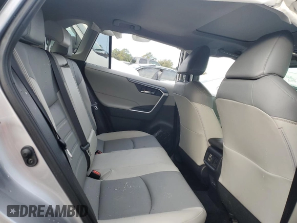 2023 Toyota RAV4 Hybrid XLE Premium z VIN JTMB6RFV8PD115723, wystawiony jako Copart lot #88005175 z przebiegiem 18 363 mil mil oraz Szkoda całkowita • Salvage title. Historia ofert i sprzedaży dostępna na DreamBid. Obrazek 11.