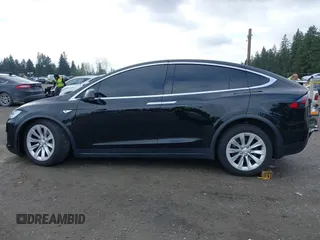 2016 Tesla Model X 70D with VIN 5YJXCBE20GF013046, listed as a IAAI auction lot 41944005 with 94,509 mi miles. Bid and sale history available at carsss.com. Image 14.