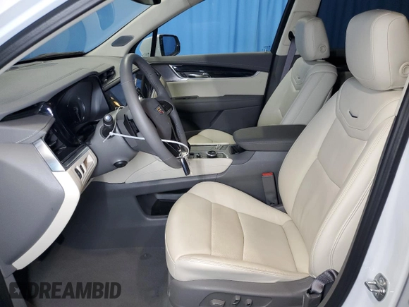 2024 Cadillac XT6 FWD Premium Luxury with VIN 1GYKPCRS7RZ738830, listed as a Copart auction lot 69222864 with 9,891 mi miles and Clean Title. Bid and sale history available at carsss.com. Image 7.