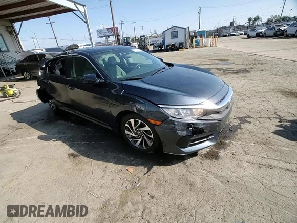 2016 Honda Civic EX with VIN 19XFC2F70GE214585, listed as a Copart auction lot 55607165 with 148,528 mi miles and Salvage Title. Bid and sale history available at DreamBid. Image 14.