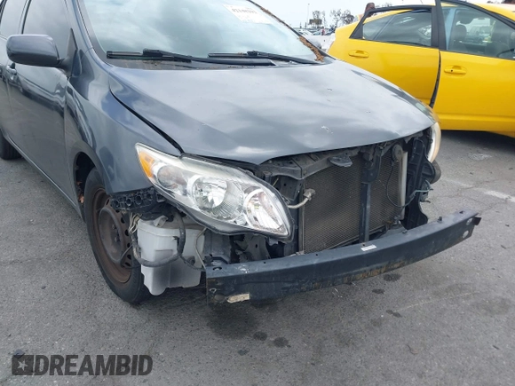2010 Toyota Corolla with VIN 1NXBU4EE3AZ169217, listed as a IAAI auction lot 42148293 with 205,965 mi miles. Bid and sale history available at carsss.com. Image 12.
