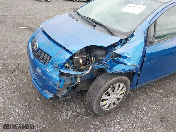 2008 Toyota Yaris with VIN JTDJT923185147854, listed as a IAAI auction lot 41737372 with 157,410 mi miles. Bid and sale history available at carsss.com. Image 6.