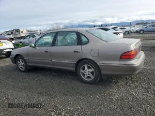 1998 Toyota Avalon XL with VIN 4T1BF18B0WU284522, listed as a Copart auction lot 45590925 with 278,690 mi miles and Salvage Title. Bid and sale history available at DreamBid. Image 2.