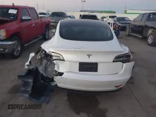 2021 Tesla Model 3 Standard Range Plus z VIN 5YJ3E1EA3MF043860, wystawiony jako IAAI lot #41214748 z przebiegiem 32 753 mil mil oraz . Historia ofert i sprzedaży dostępna na DreamBid. Obrazek 15.