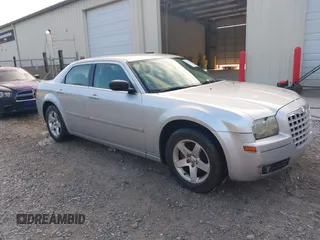 2007 Chrysler 300 Limited with VIN 2C3KA53G77H858104, listed as a IAAI auction lot 42742614 with 231,747 mi miles and . Bid and sale history available at DreamBid. Image 1.