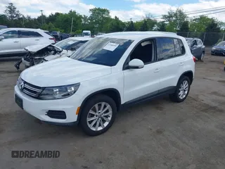 2014 Volkswagen Tiguan S with VIN WVGBV3AX0EW589381, listed as a IAAI auction lot 42186999 with 144,137 mi miles and . Bid and sale history available at DreamBid. Image 20.