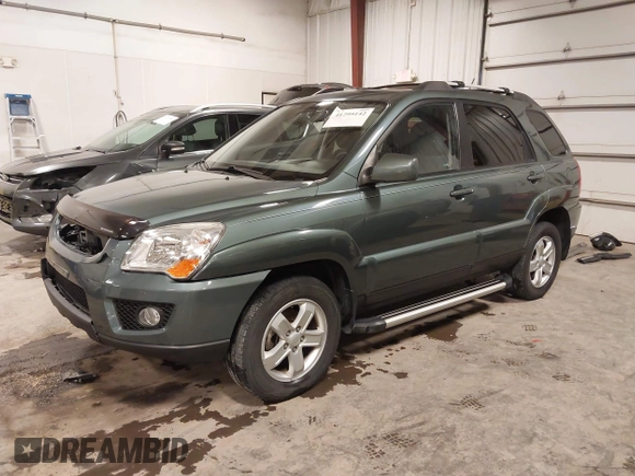 2009 Kia Sportage LX with VIN KNDJE723097558182, listed as a IAAI auction lot 41295142 with 147,200 mi miles. Bid and sale history available at carsss.com. Image 18.