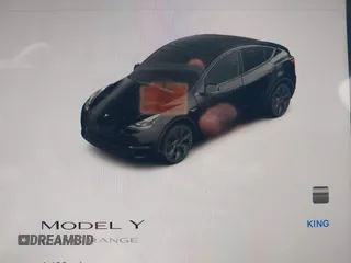 2025 Tesla Model Y Long Range with VIN 7SAYGDEDXSA349480, listed as a IAAI auction lot 41492740 with 1,486 mi miles and . Bid and sale history available at DreamBid. Image 7.