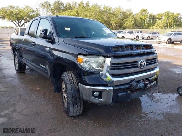 2014 Toyota Tundra 4WD Truck SR with VIN 5TFUW5F1XEX377799, listed as a IAAI auction lot 41889381 with 225,551 mi miles. Bid and sale history available at carsss.com. Image 1.