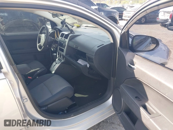 2009 Dodge Caliber SXT with VIN 1B3HB48A39D142674, listed as a IAAI auction lot 41642867 with 156,504 mi miles and . Bid and sale history available at carsss.com. Image 5.