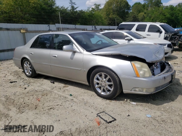 2009 Cadillac DTS 1SA z VIN 1G6KD57Y69U114700, wystawiony jako Copart lot #56007485 z przebiegiem 158 849 mil mil oraz Szkoda całkowita • Salvage title. Historia ofert i sprzedaży dostępna na DreamBid. Obrazek 4.