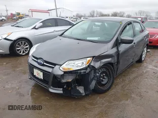 2012 Ford Focus SE with VIN 1FAHP3F26CL220986, listed as a IAAI auction lot 41719127 with 127,050 mi miles and . Bid and sale history available at DreamBid. Image 2.