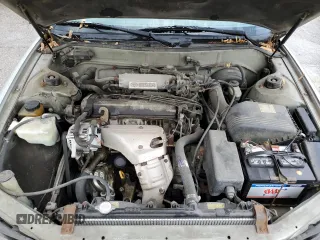 1995 Toyota Camry LE z VIN 4T1SK12E2SU617134, wystawiony jako Copart lot #54775365 z przebiegiem 305 046 mil mil oraz Szkoda całkowita • Salvage title. Historia ofert i sprzedaży dostępna na DreamBid. Obrazek 11.