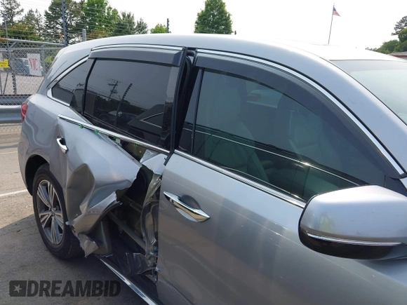 2020 Acura MDX with VIN 5J8YD3H39LL016466, listed as a IAAI auction lot 42376611 with 74,873 mi miles and . Bid and sale history available at DreamBid. Image 6.