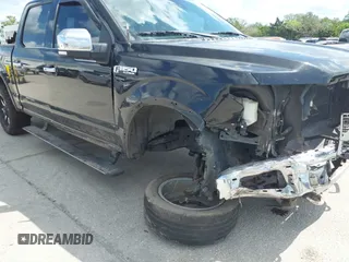 2015 Ford F-150 XLT with VIN 1FTEW1EF4FFC52928, listed as a IAAI auction lot 41994726 with 211,628 mi miles. Bid and sale history available at carsss.com. Image 1.
