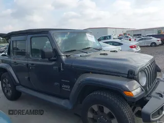 2018 Jeep Wrangler Unlimited Sahara z VIN 1C4HJXEG5JW194523, wystawiony jako IAAI lot #42056557 z przebiegiem 71 141 mil mil oraz . Historia ofert i sprzedaży dostępna na DreamBid. Obrazek 13.