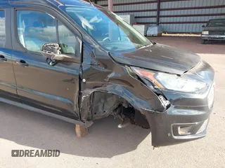 2021 Ford Transit Connect XLT with VIN NM0GS9F27M1500434, listed as a IAAI auction lot 39234991 with 25,883 mi miles and . Bid and sale history available at DreamBid. Image 6.