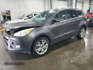 2015 Ford Escape Titanium with VIN 1FMCU9J90FUA26808, listed as a Copart auction lot 54449805 with 184,576 mi miles and Salvage title. Bid and sale history available at DreamBid. Image 1.